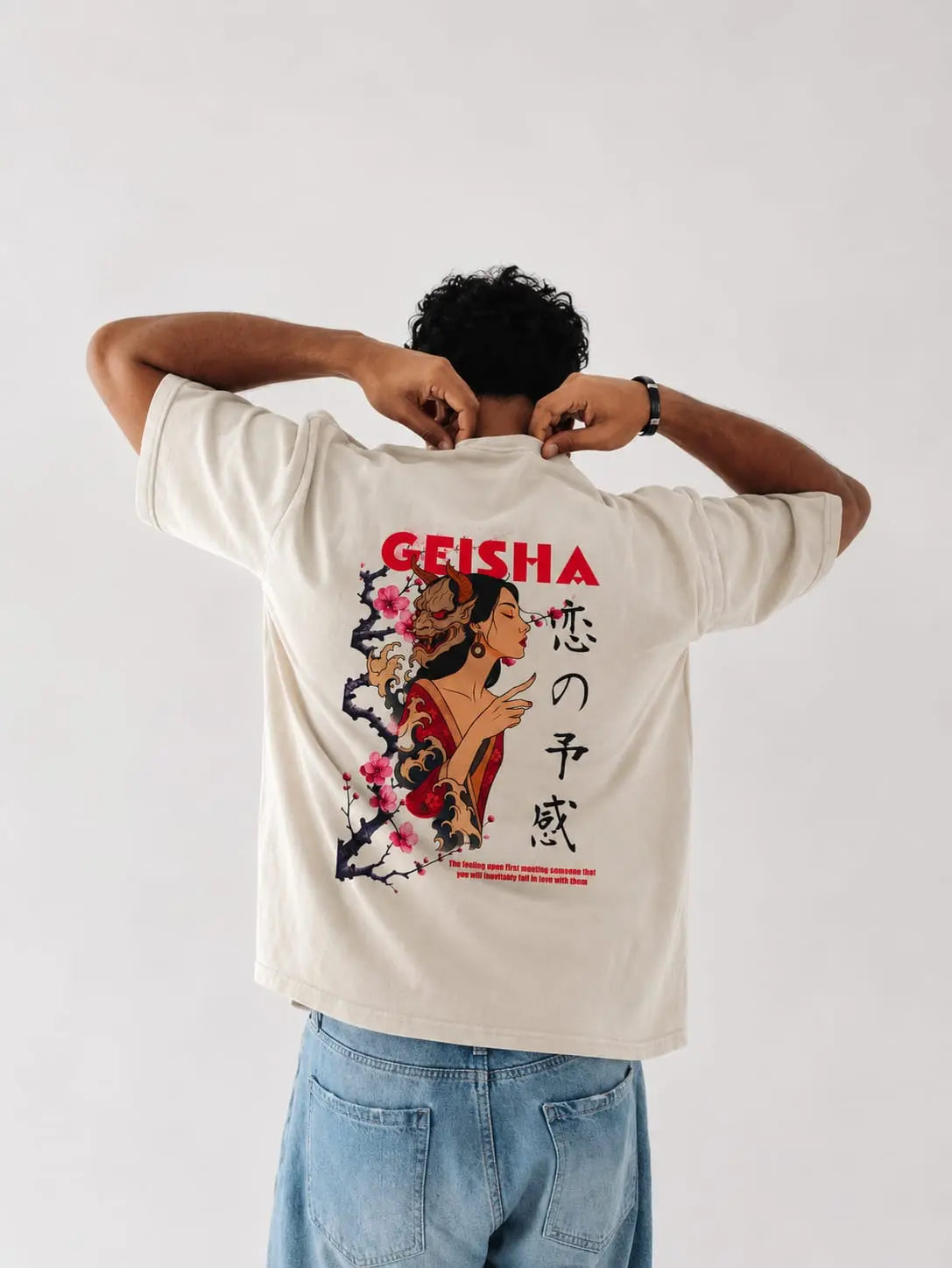 Back view of model wearing GEISHA Oversized Tee showcasing Japanese-inspired geisha streetwear graphic